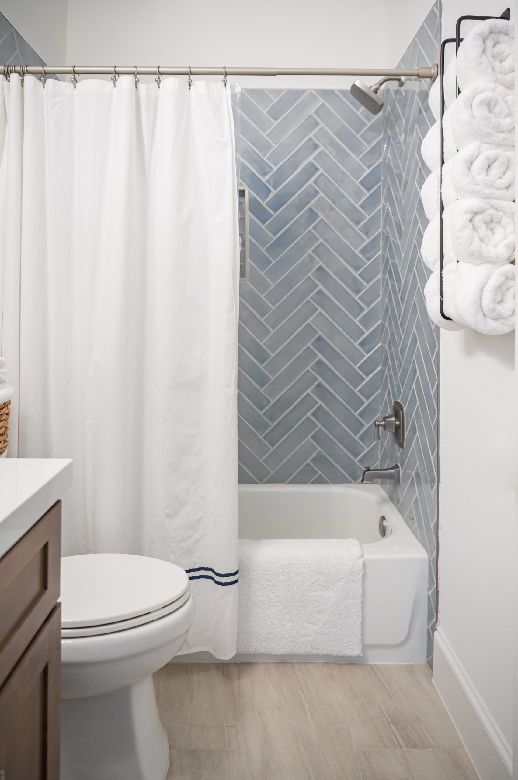 Bathroom interior design with blue shower ceramic wall tile backsplash