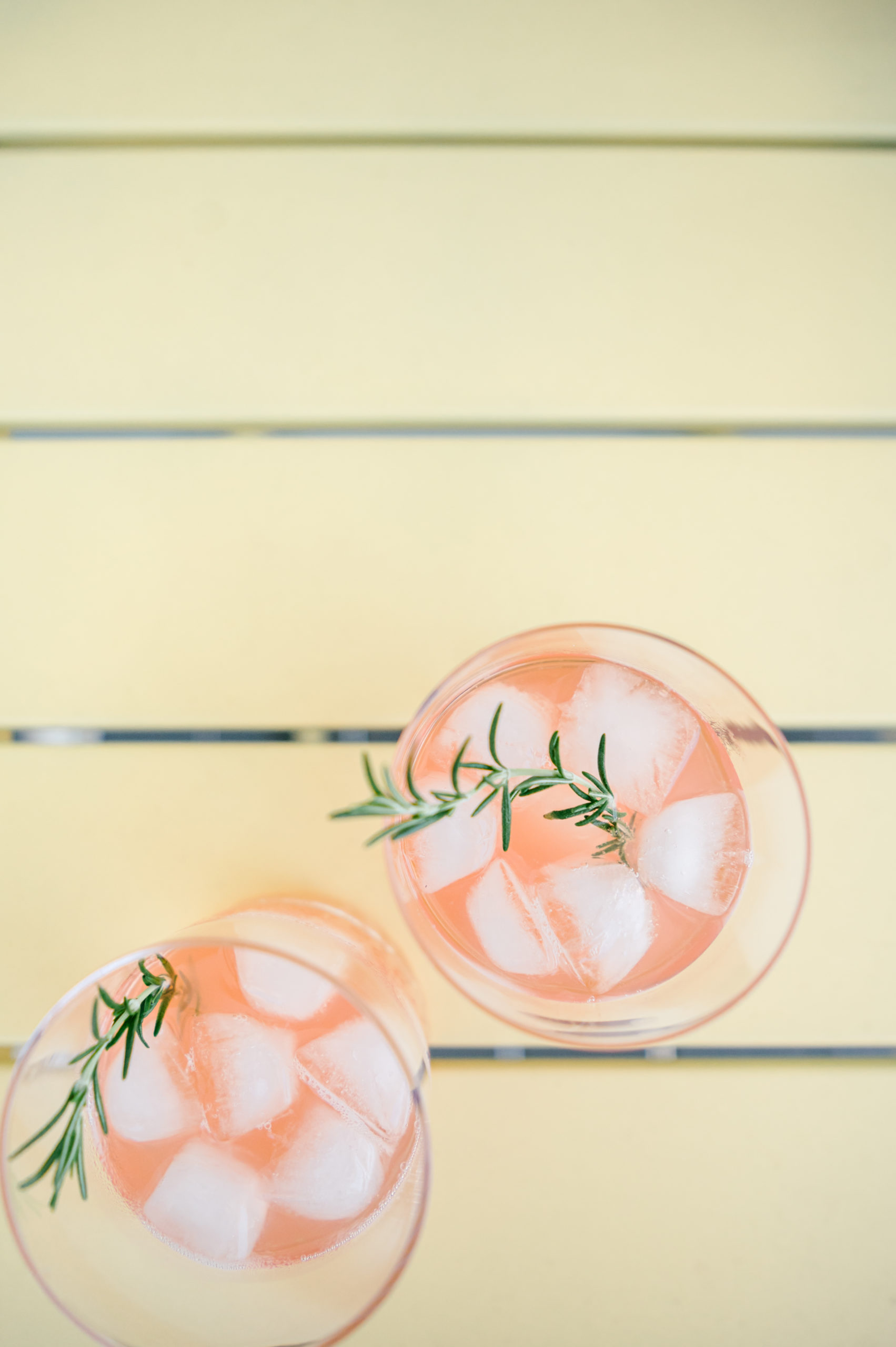 Vacation Rental Photography photos of Grapefruit cocktail sitting on patio table outside