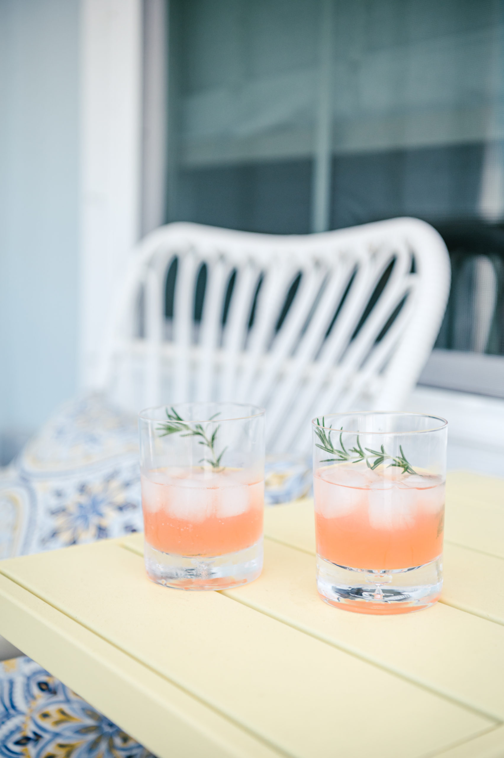 Vacation Rental Photography photos of Grapefruit cocktail sitting on patio table outside