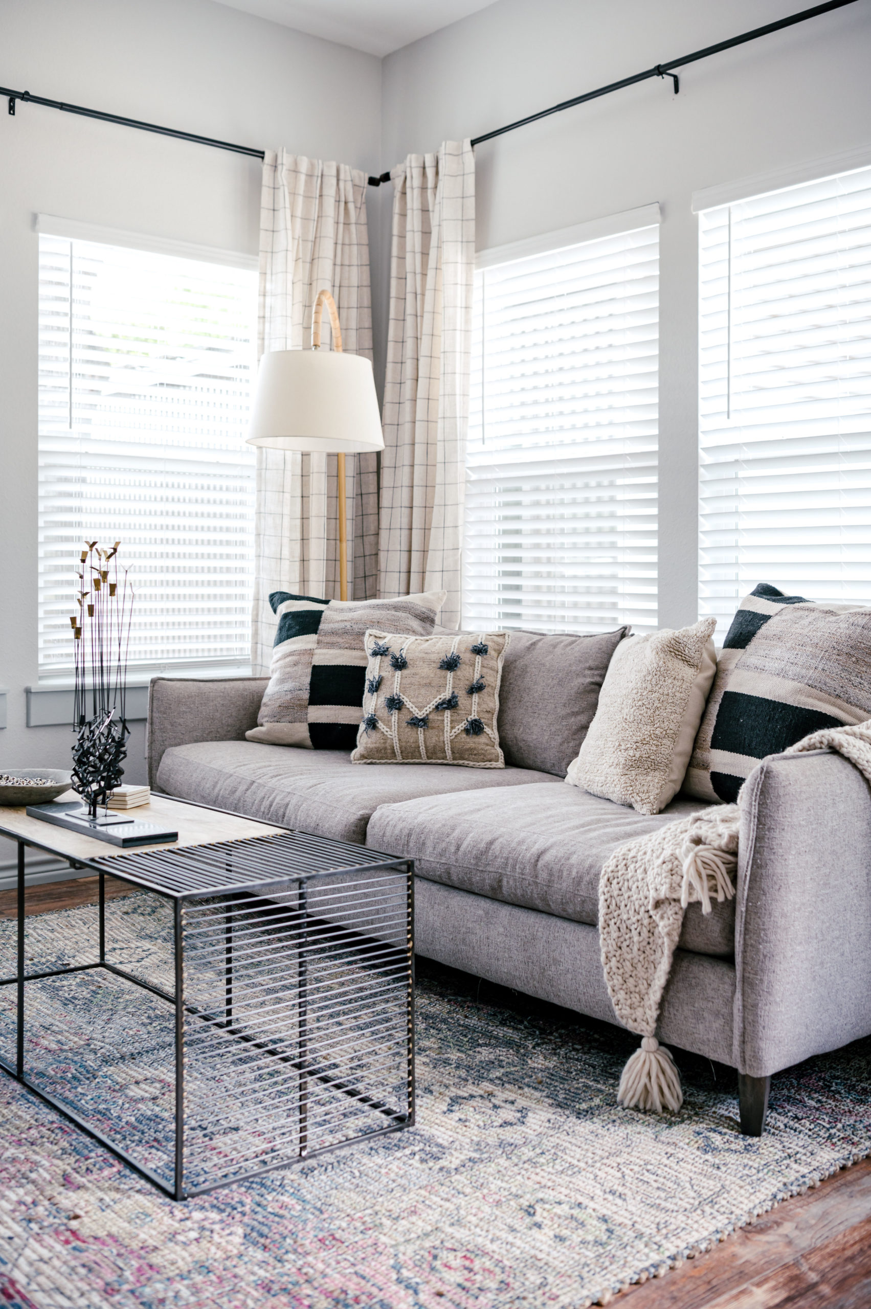 Interior Design Photography of Living room with a grey couch sitting in front of living room table