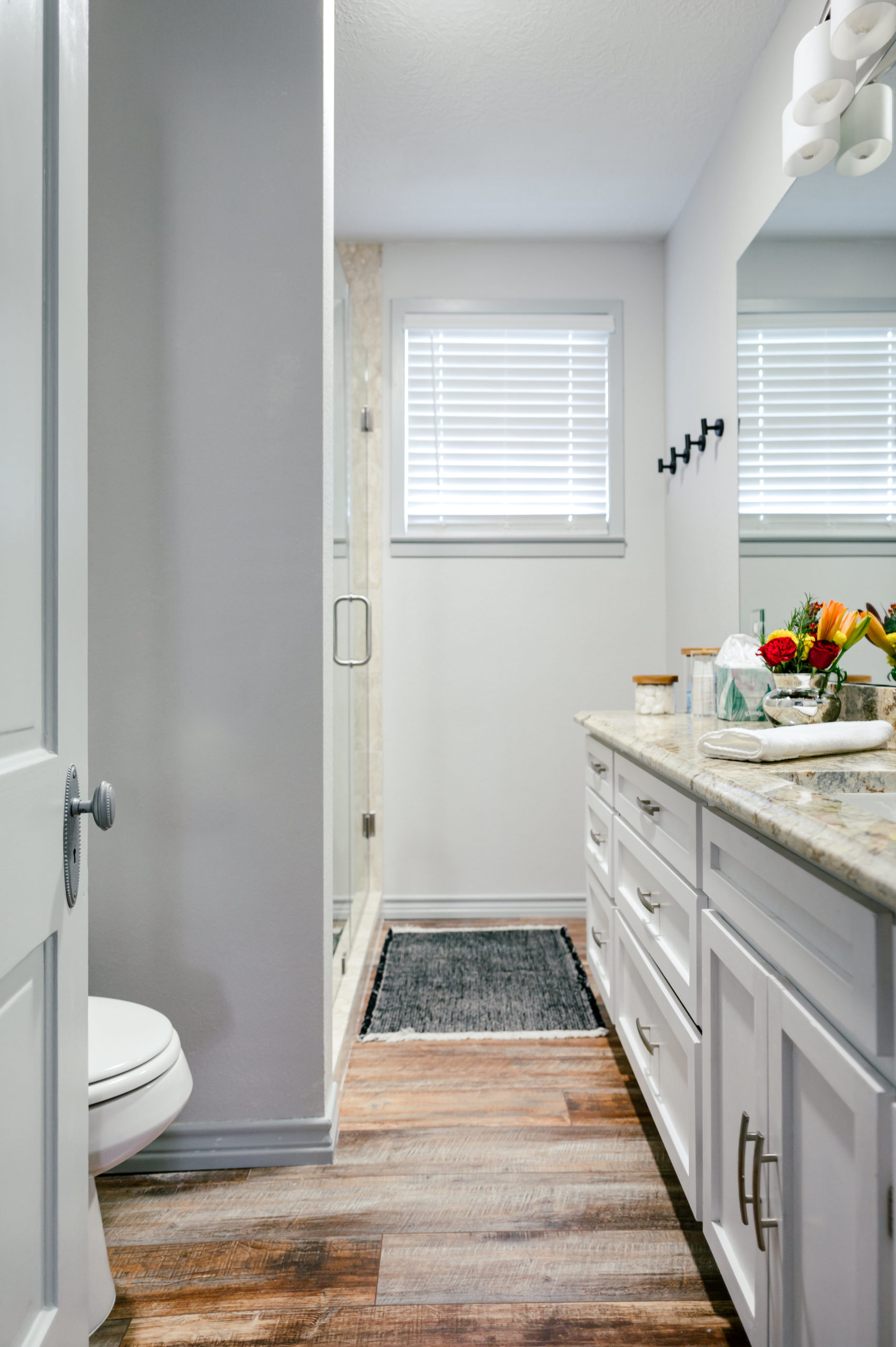 Bathroom sink and wooden floor