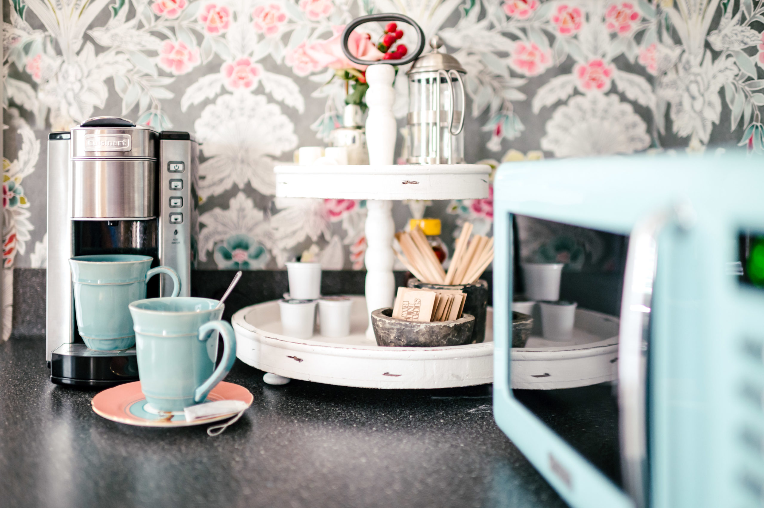 Kitchen counter with coffee maker and coffee essentials
