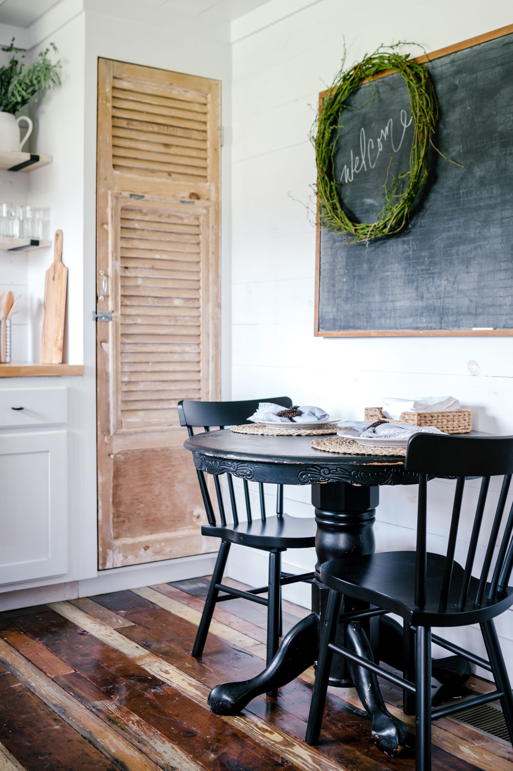 Airbnb photography of black dining room chair and tables 