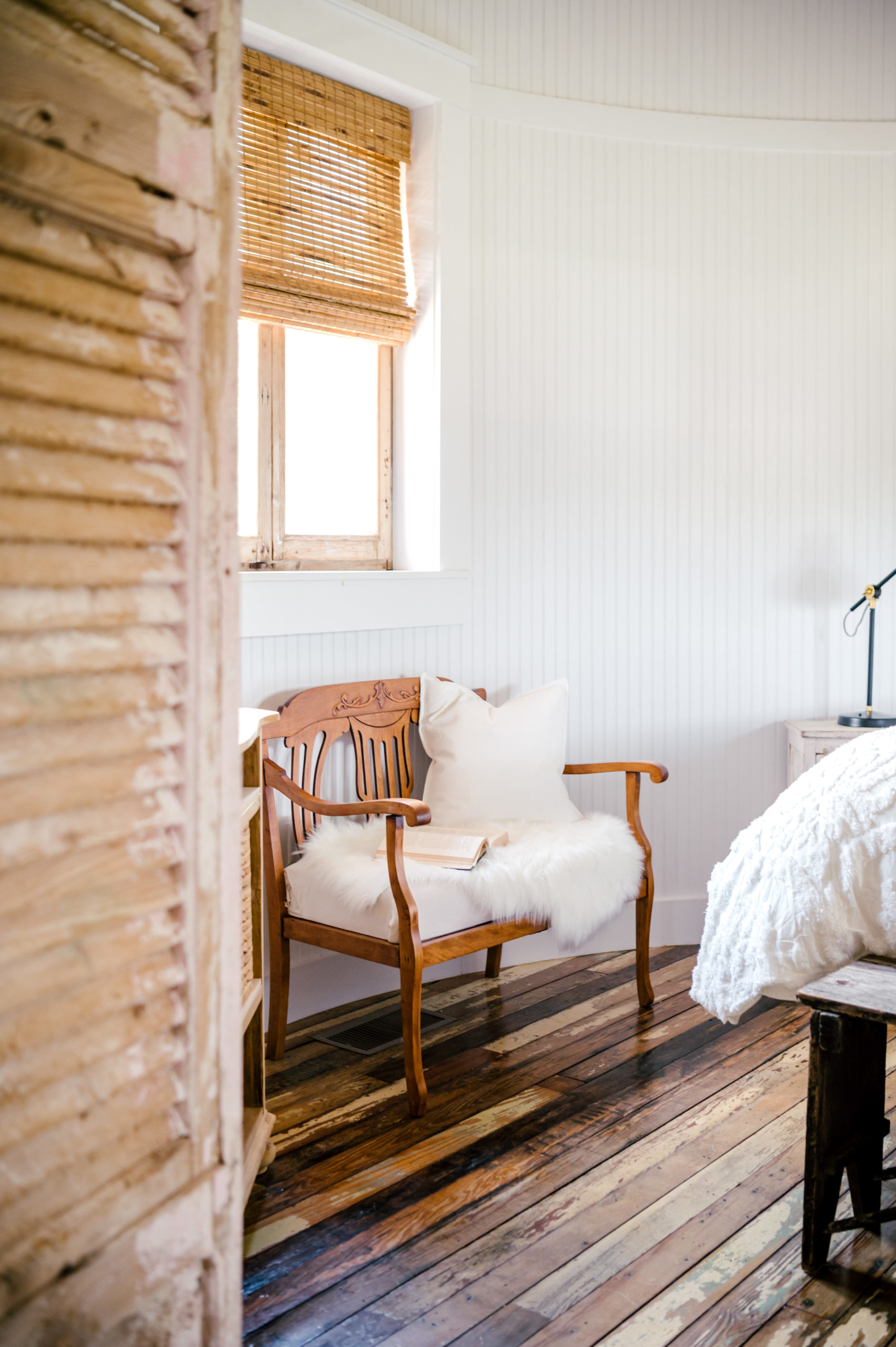 Wooden seat bench used as furniture in a bedroom 