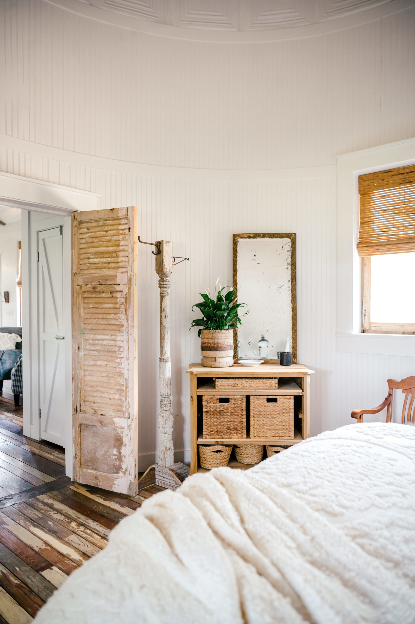 Airbnb photography of bedroom interior design, with wooden dresser and mirror