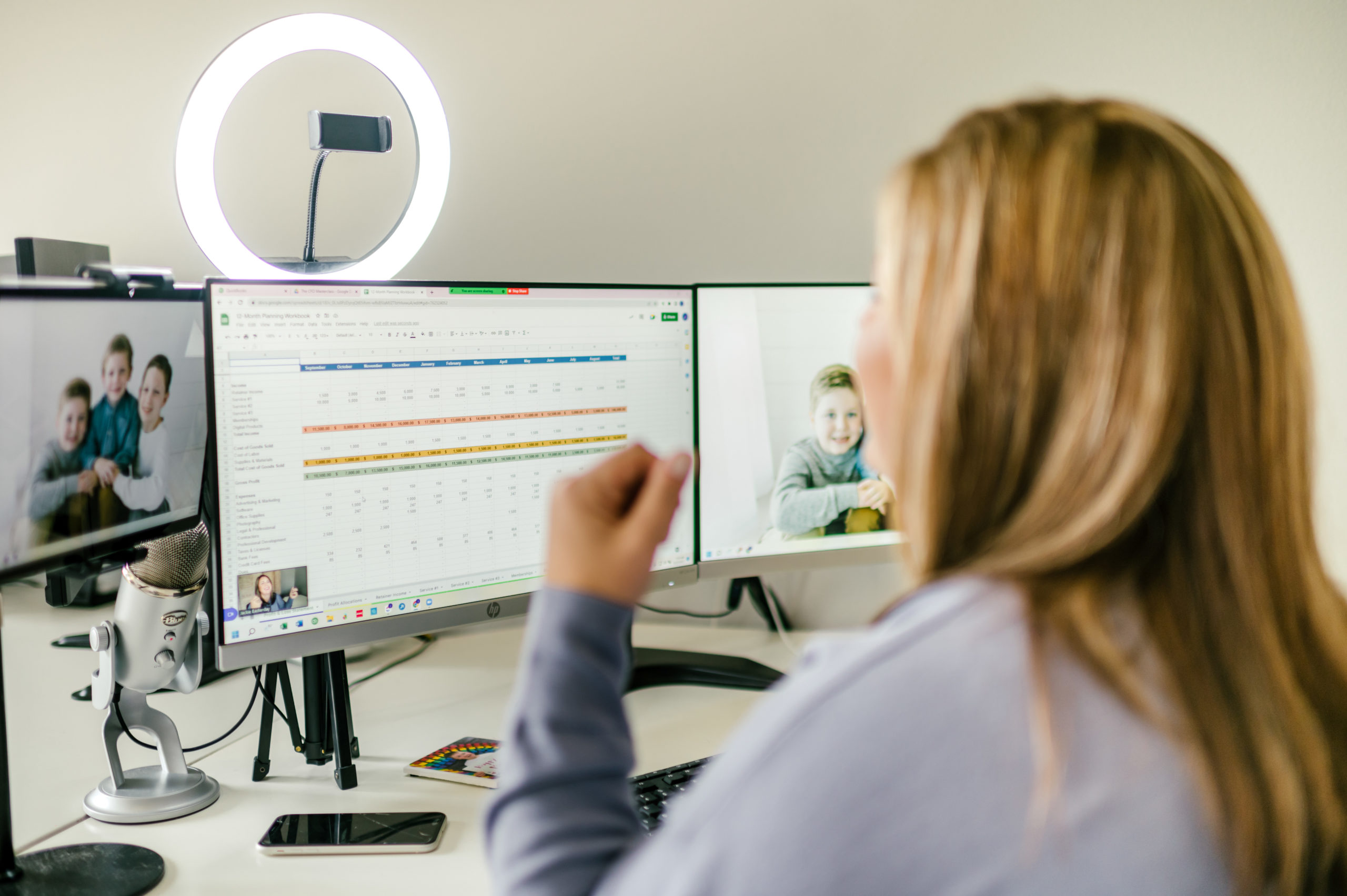 CPA Business woman working on computer with Google sheets open 