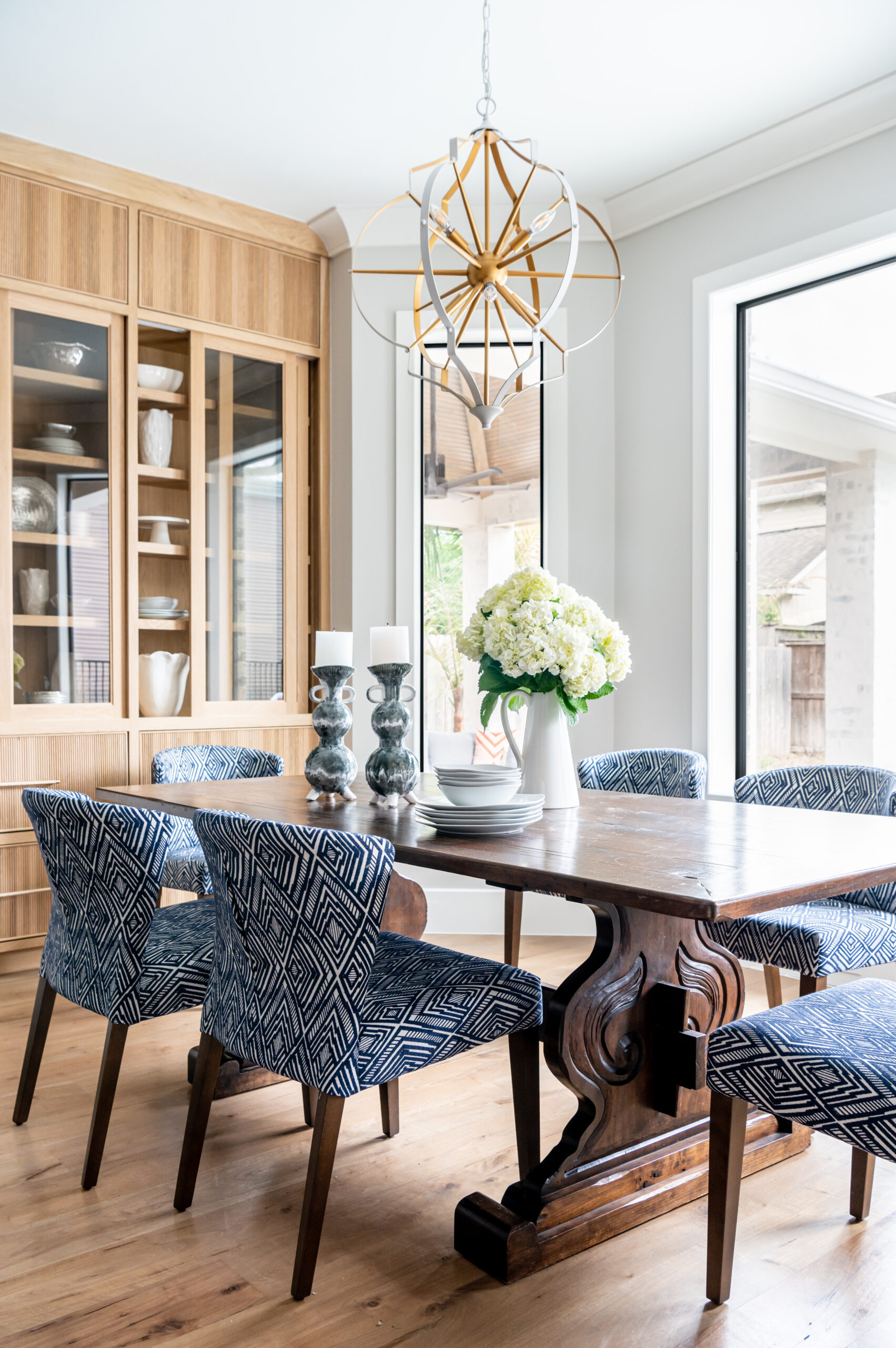 Dining room interior design with natural light shining through