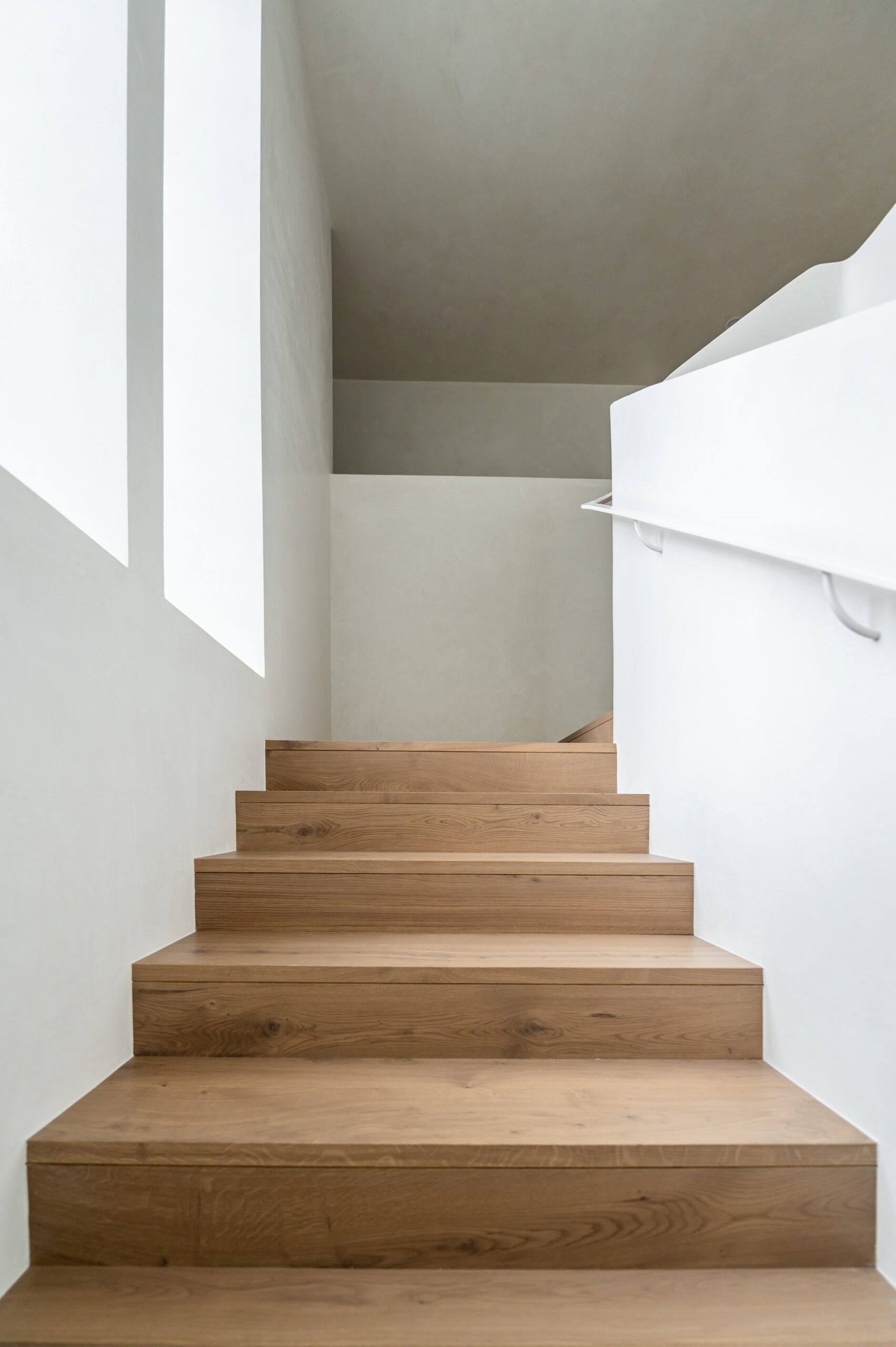 Bright and white wooden staircase