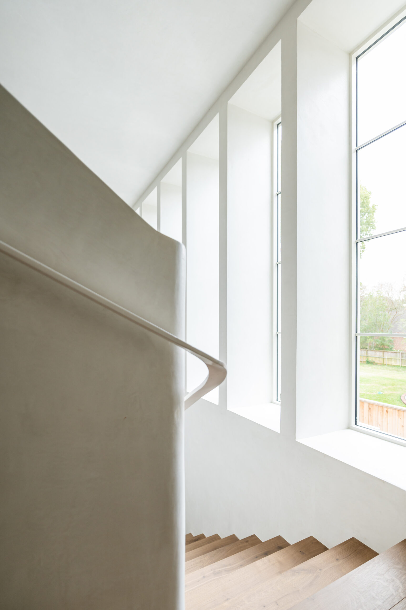 Bright and white wooden staircase