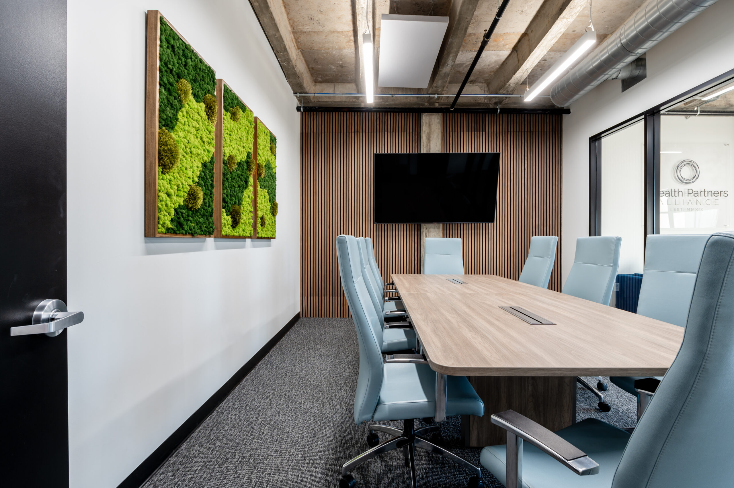 Office interior design with plant art work