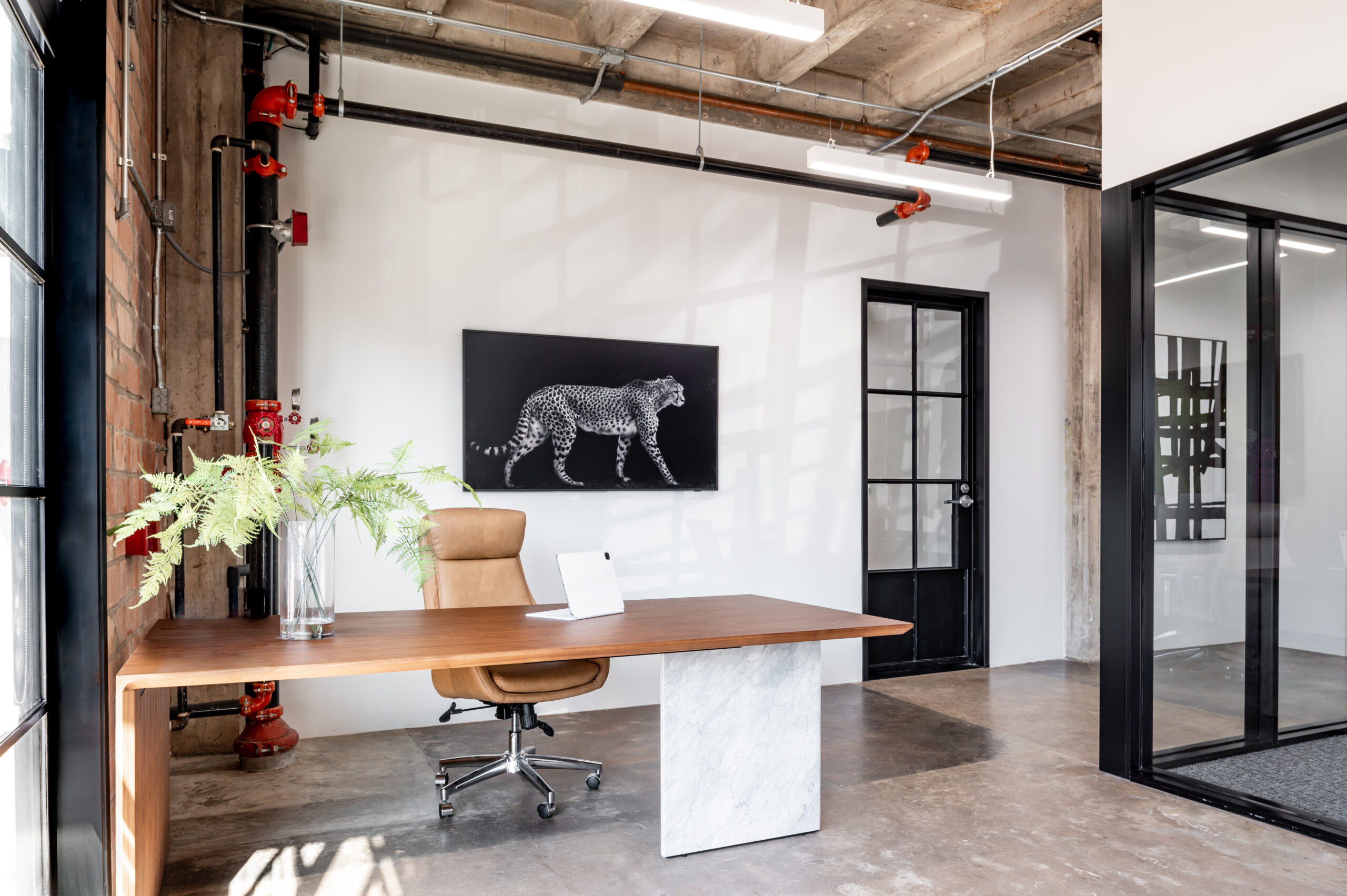 Office interior design with wood and marble desk