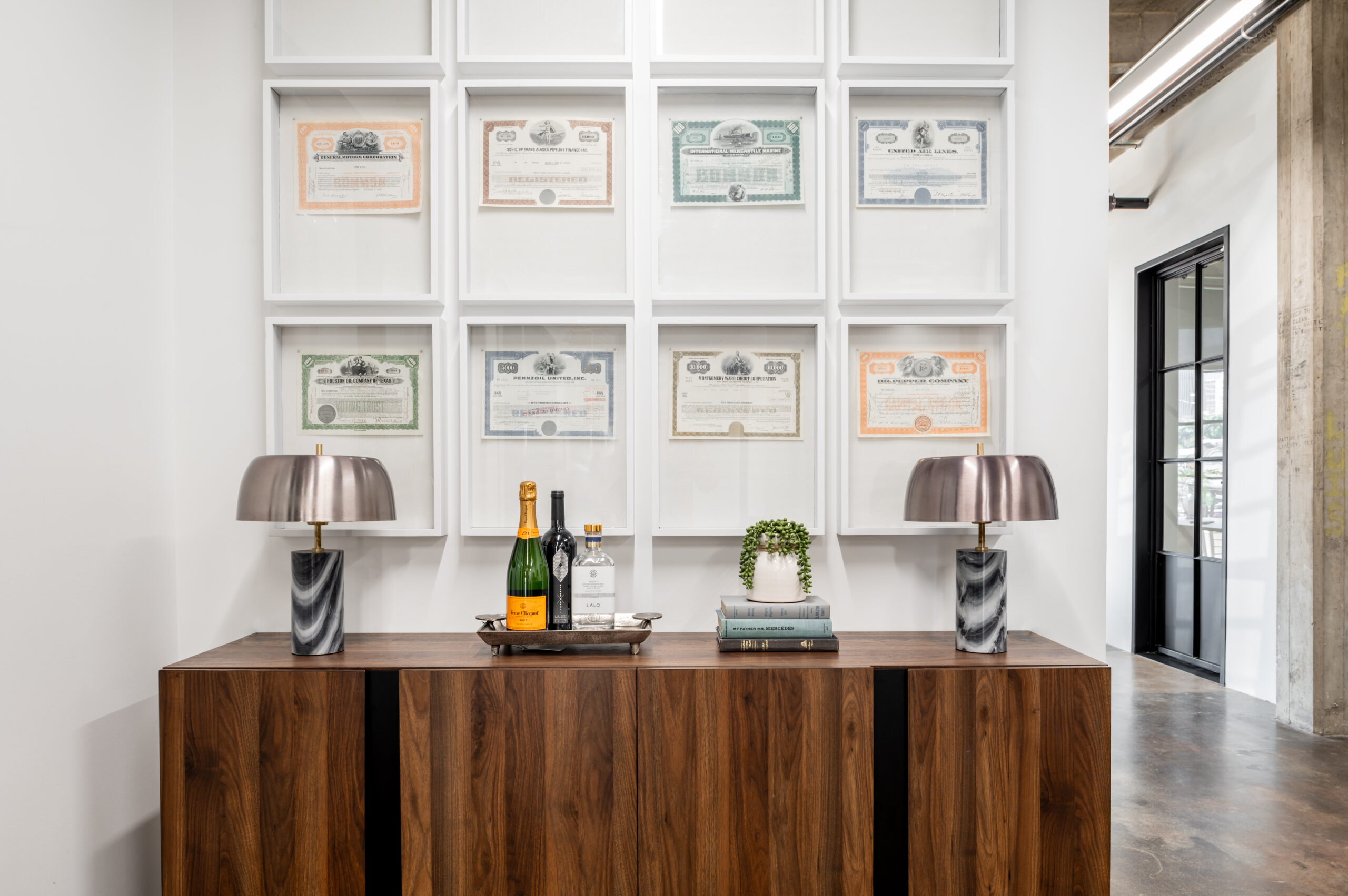 Industrial interior design with wood table and marble lamps