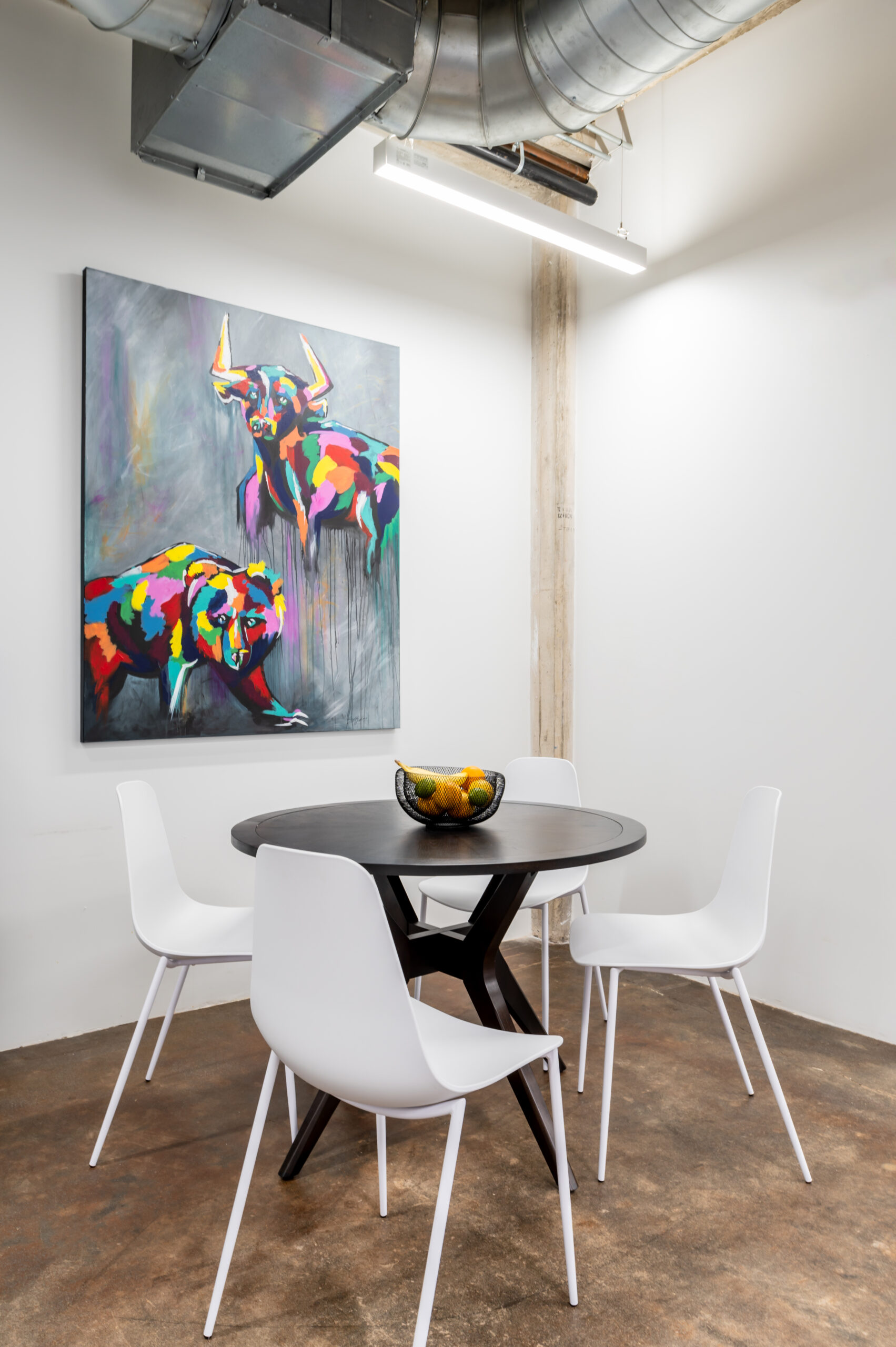 Bright office space with colorful wall art