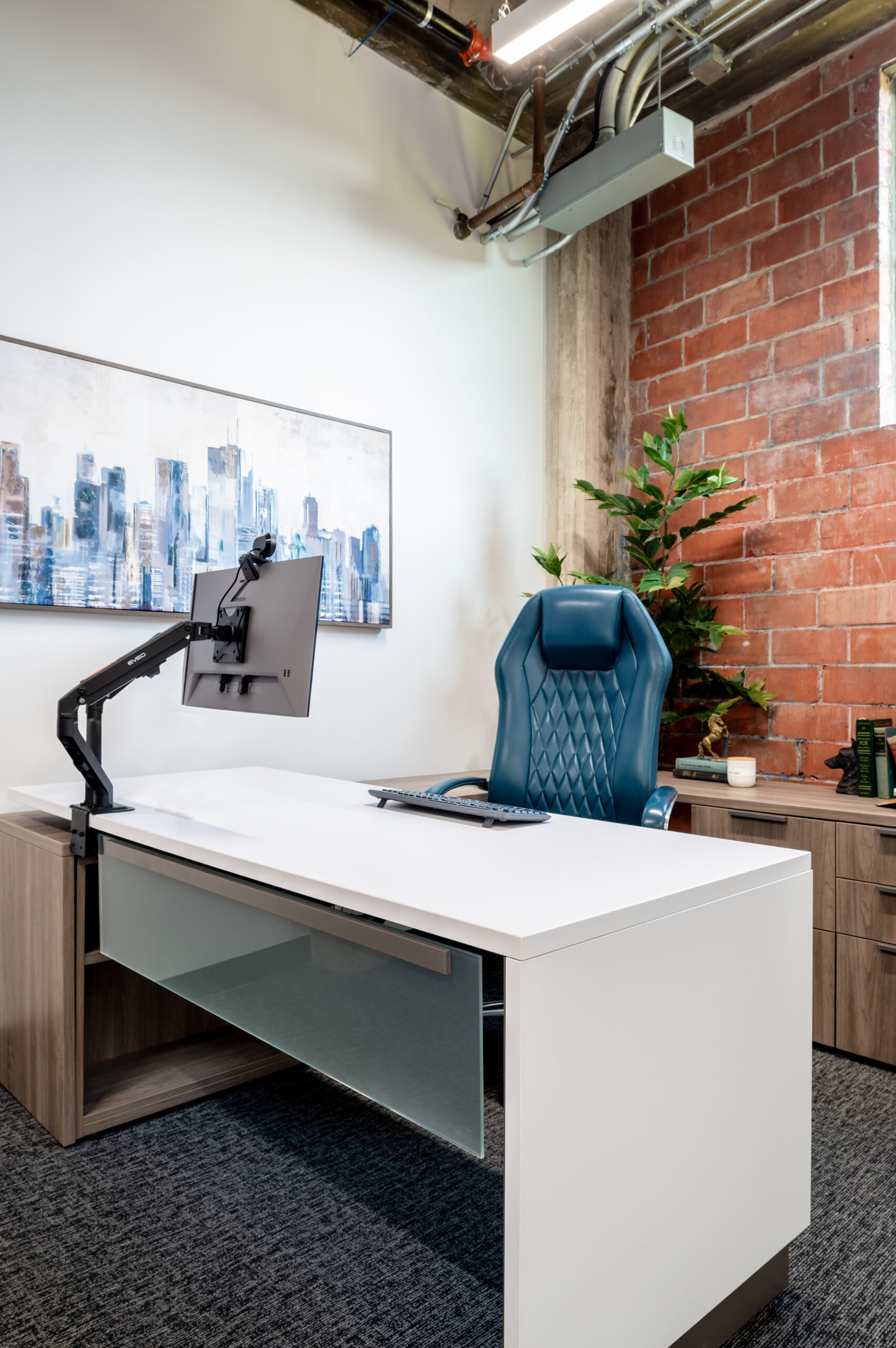 Industrial interior design office space with brick walls