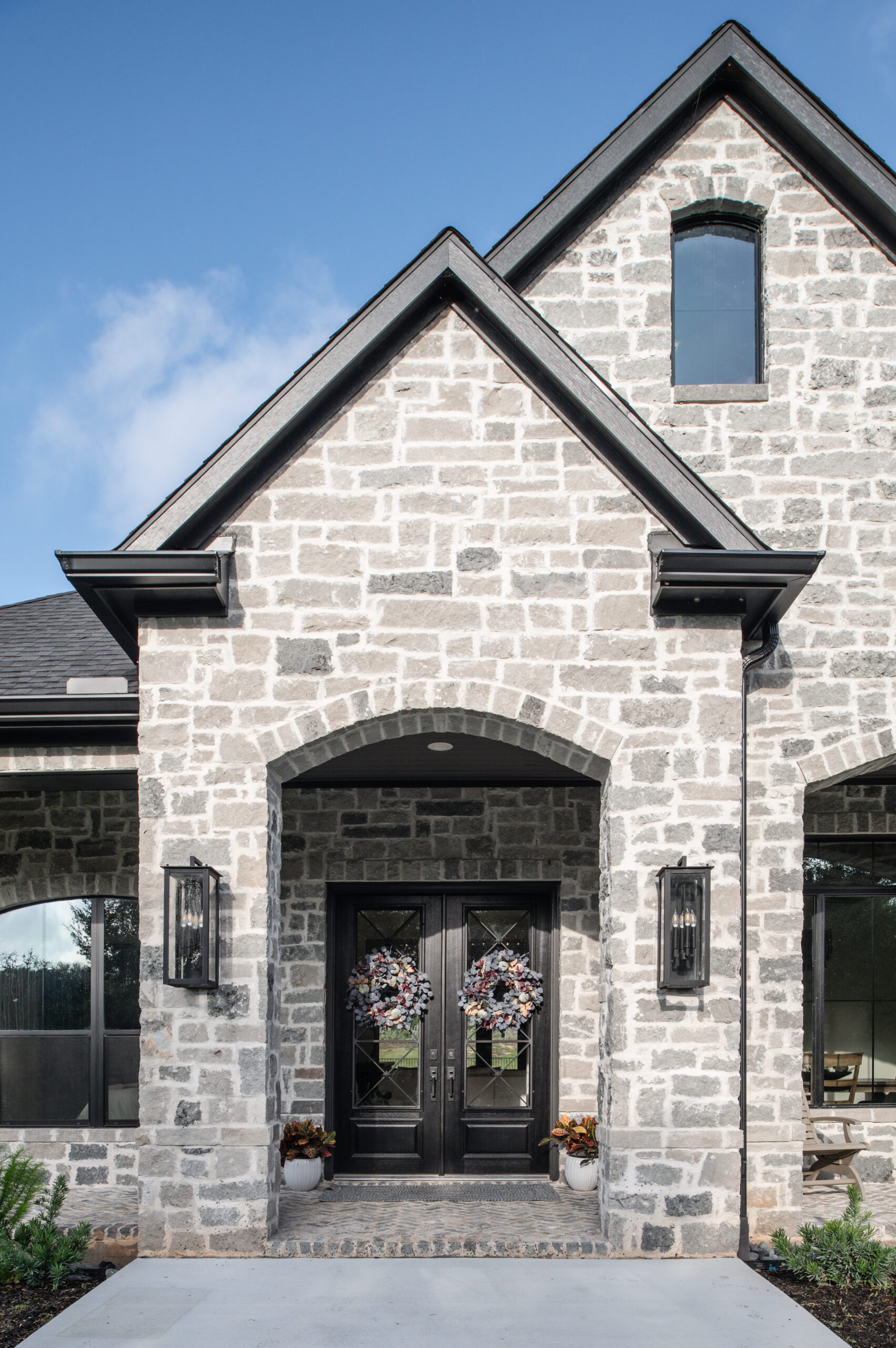 Beautiful front door entryway with exterior brickwork