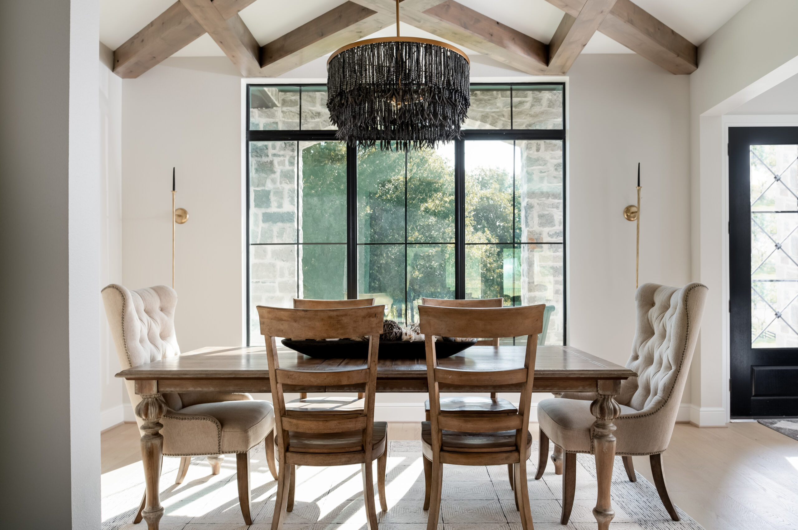 Custom home photography of dining room with wooden table and chairs