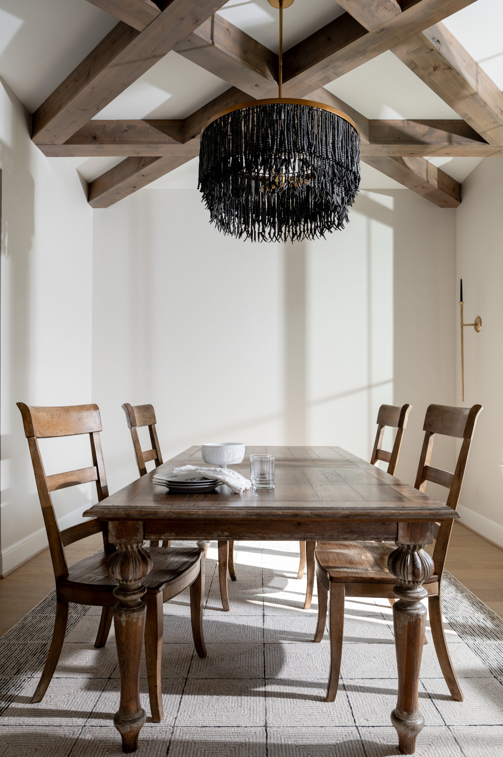 Custom home photography of dining room with wooden table and chairs