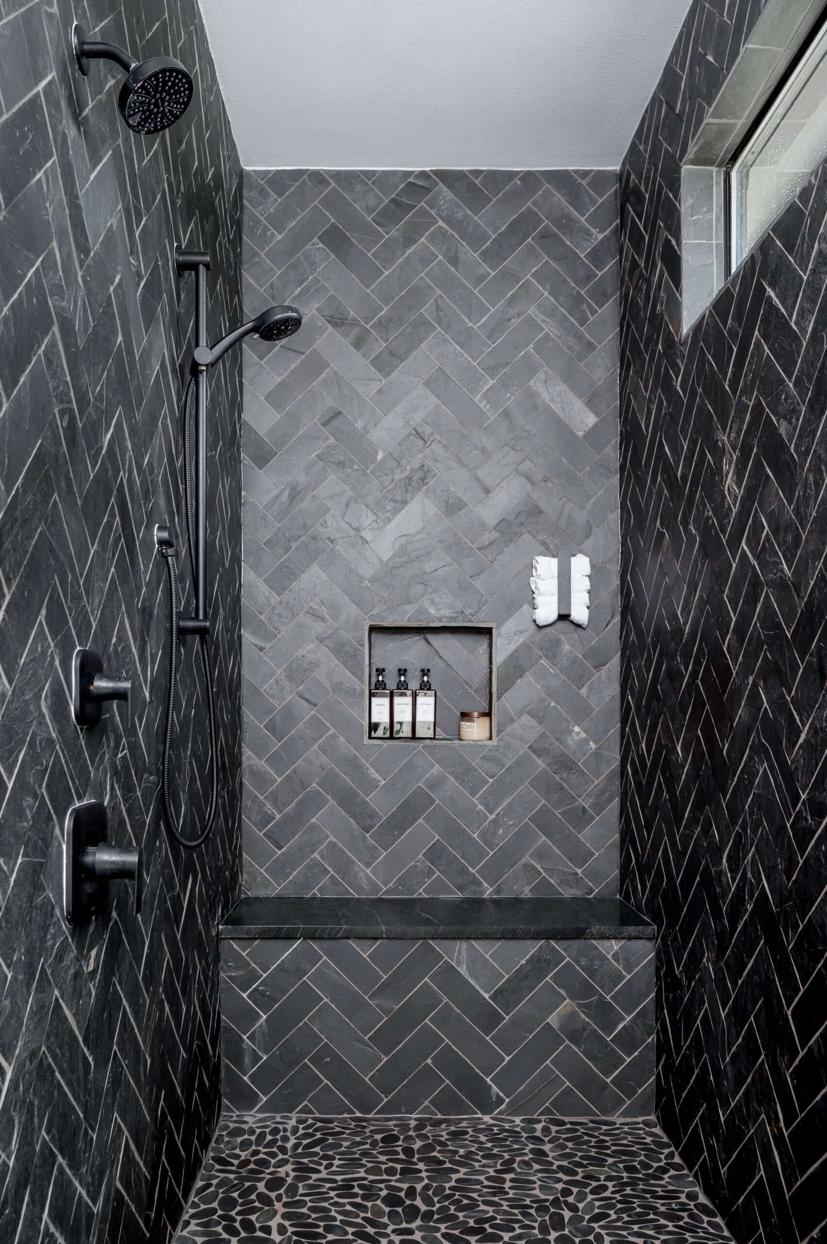 Stunning black tiled shower
