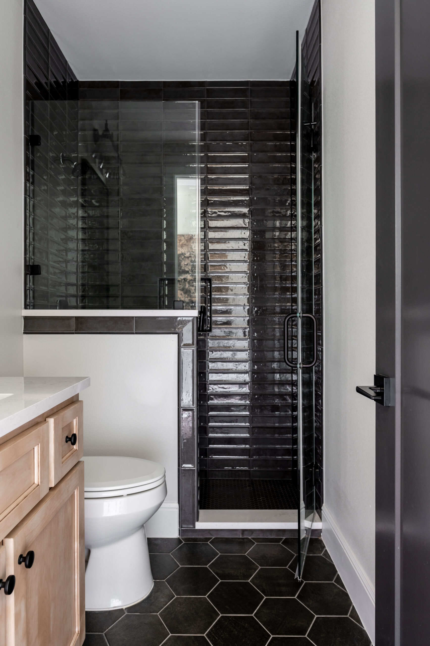 Custom Home photography of timeless black and white designed bathroom