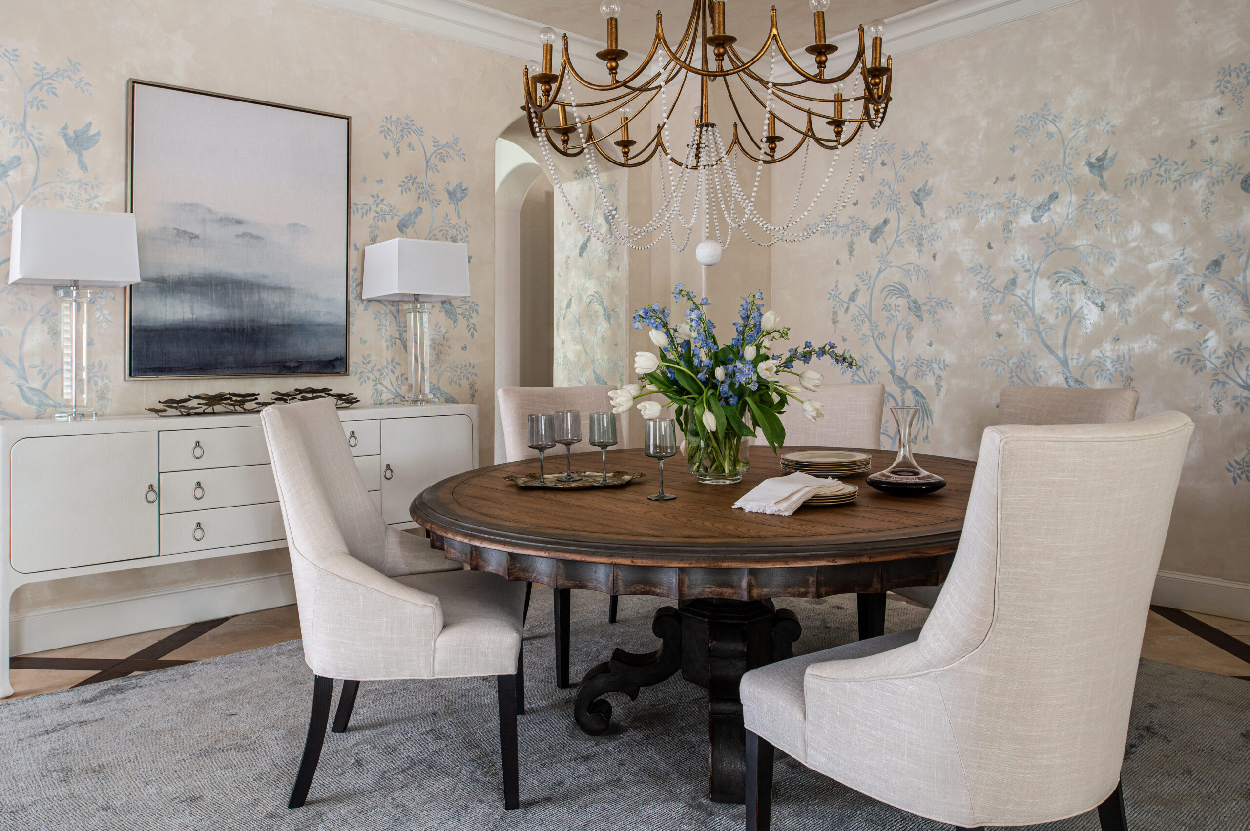 Beautiful interior design photos of a old-world style dining room with a stunning chandelier