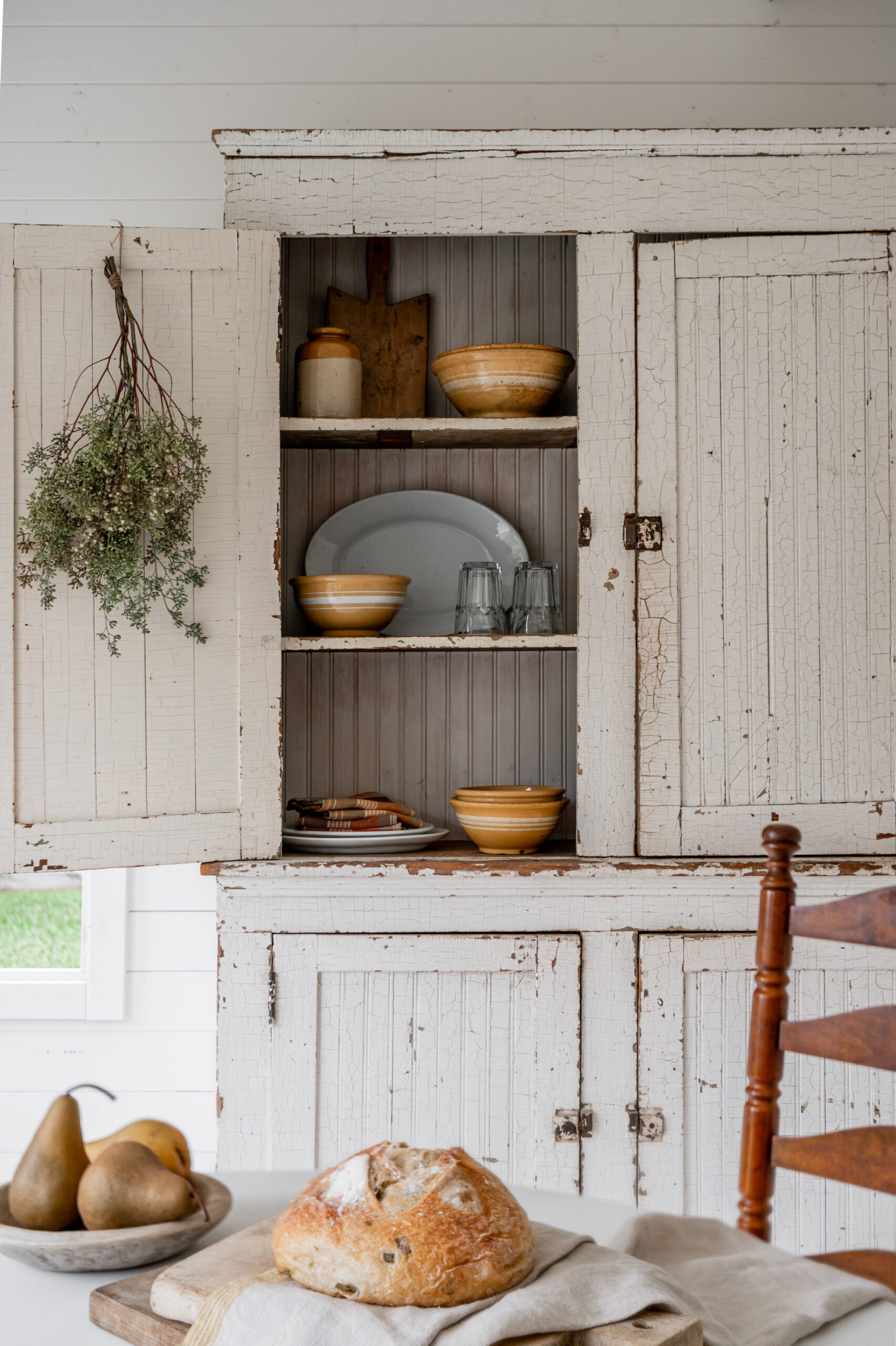 Vintage cabinetry with plates and cups