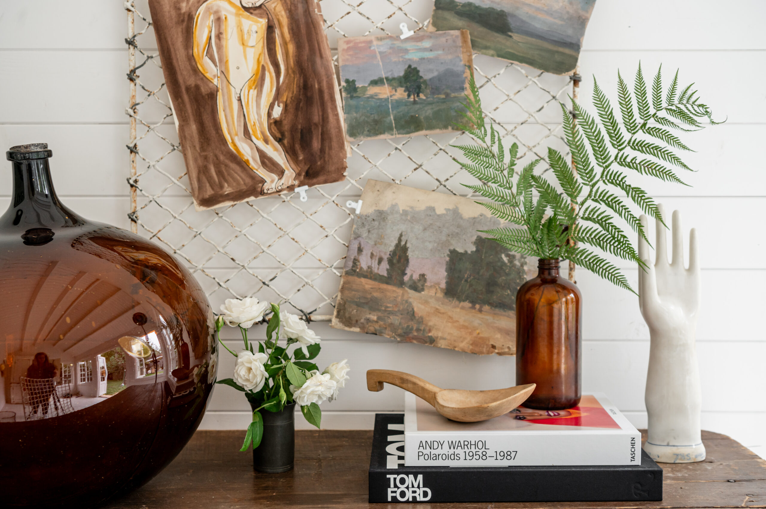 Vintage wooden desk with modern and antique decor