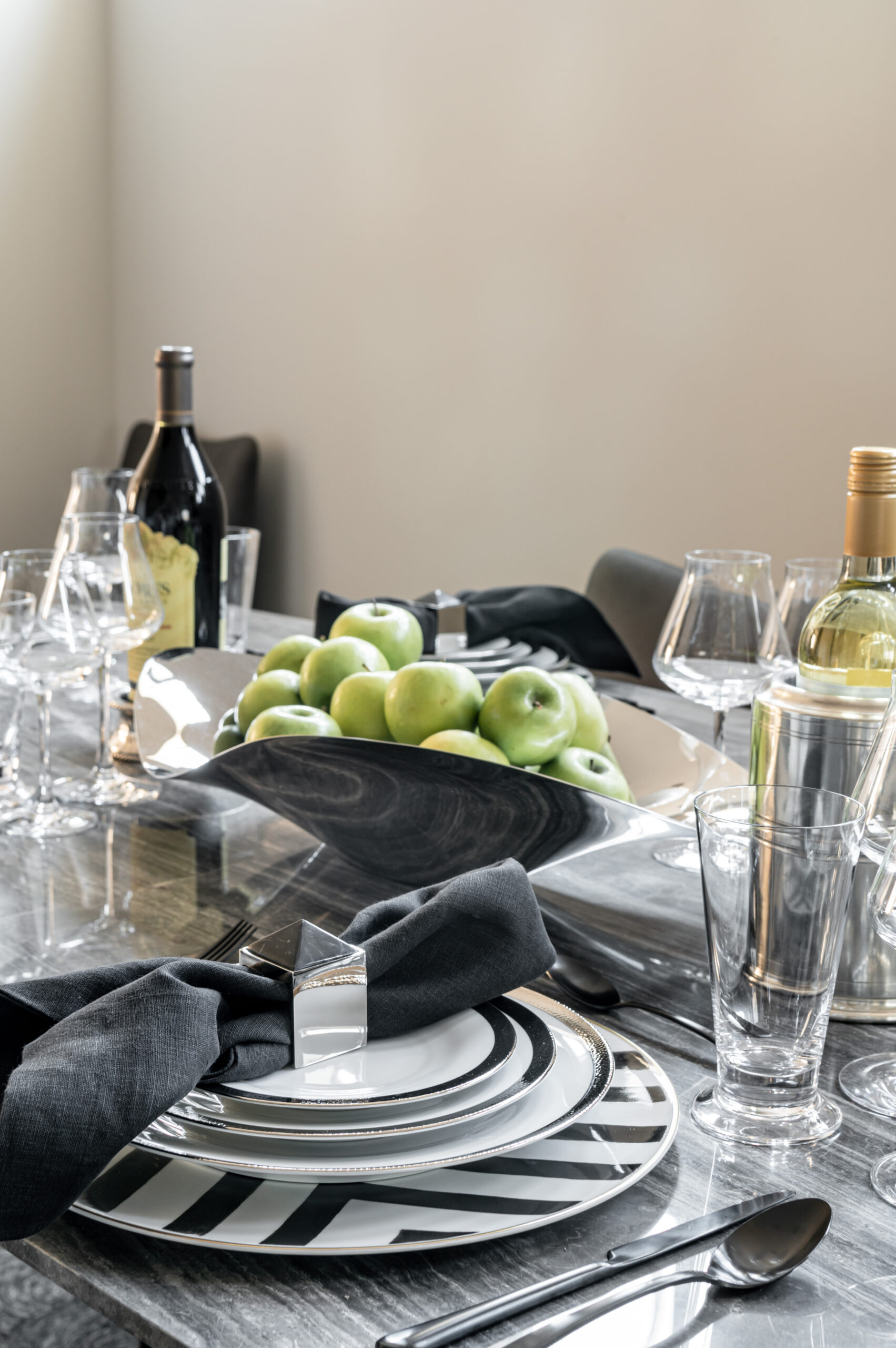 Dining room table setting with black and white decor