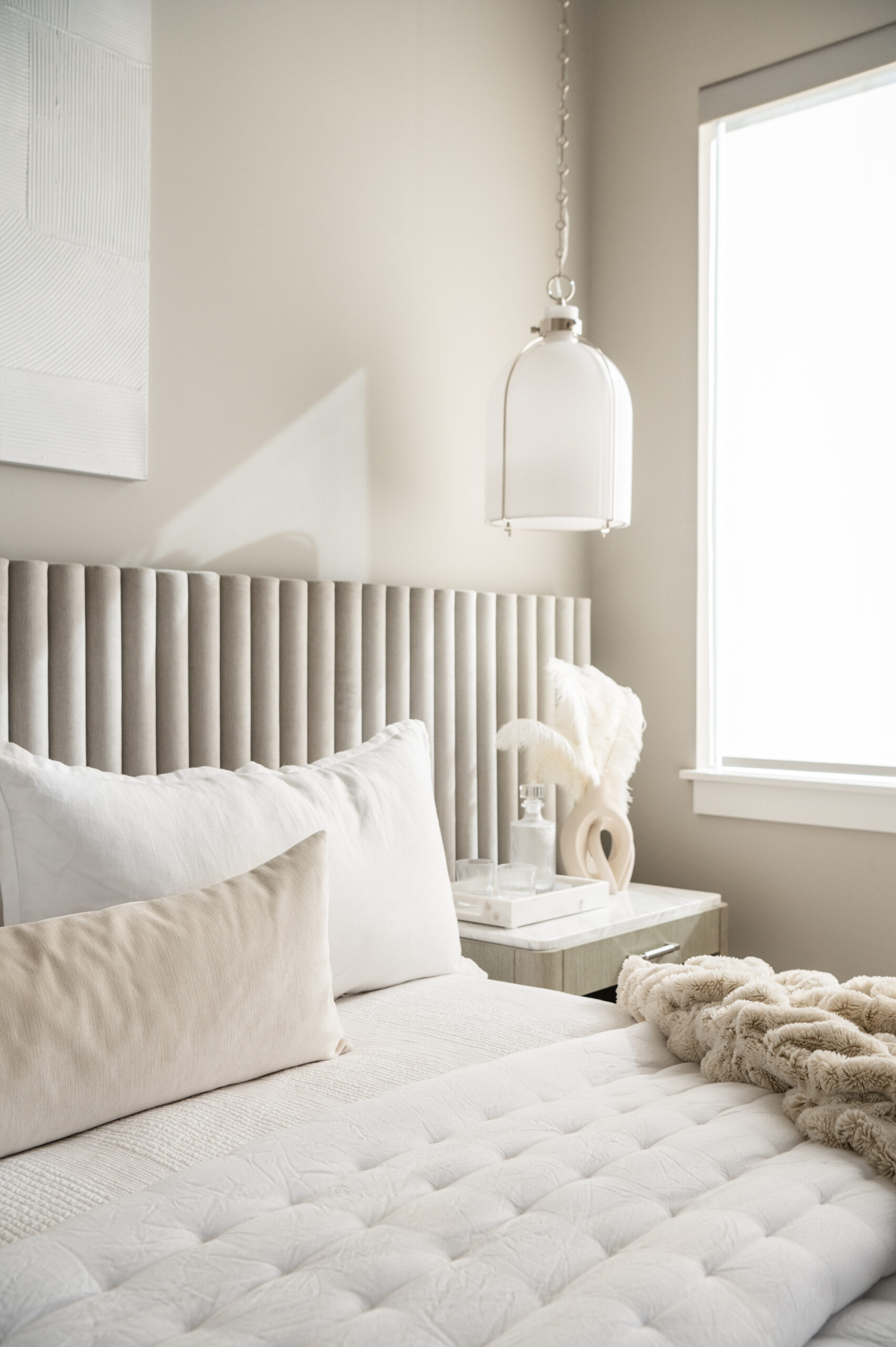 Serene all white and tan bedroom interior design