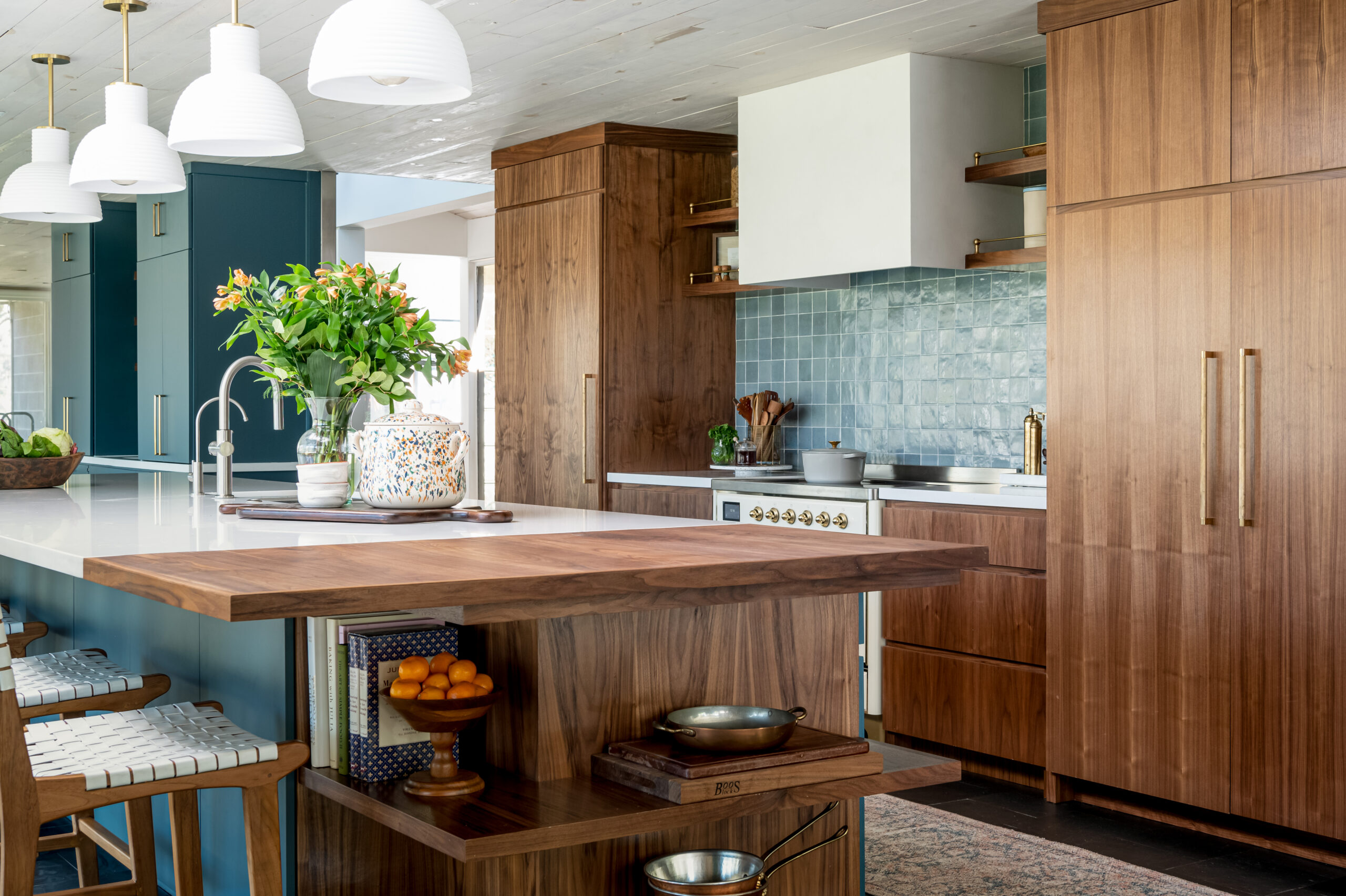 Midcentury kitchen interior design, with tile backsplash and wood cabinets