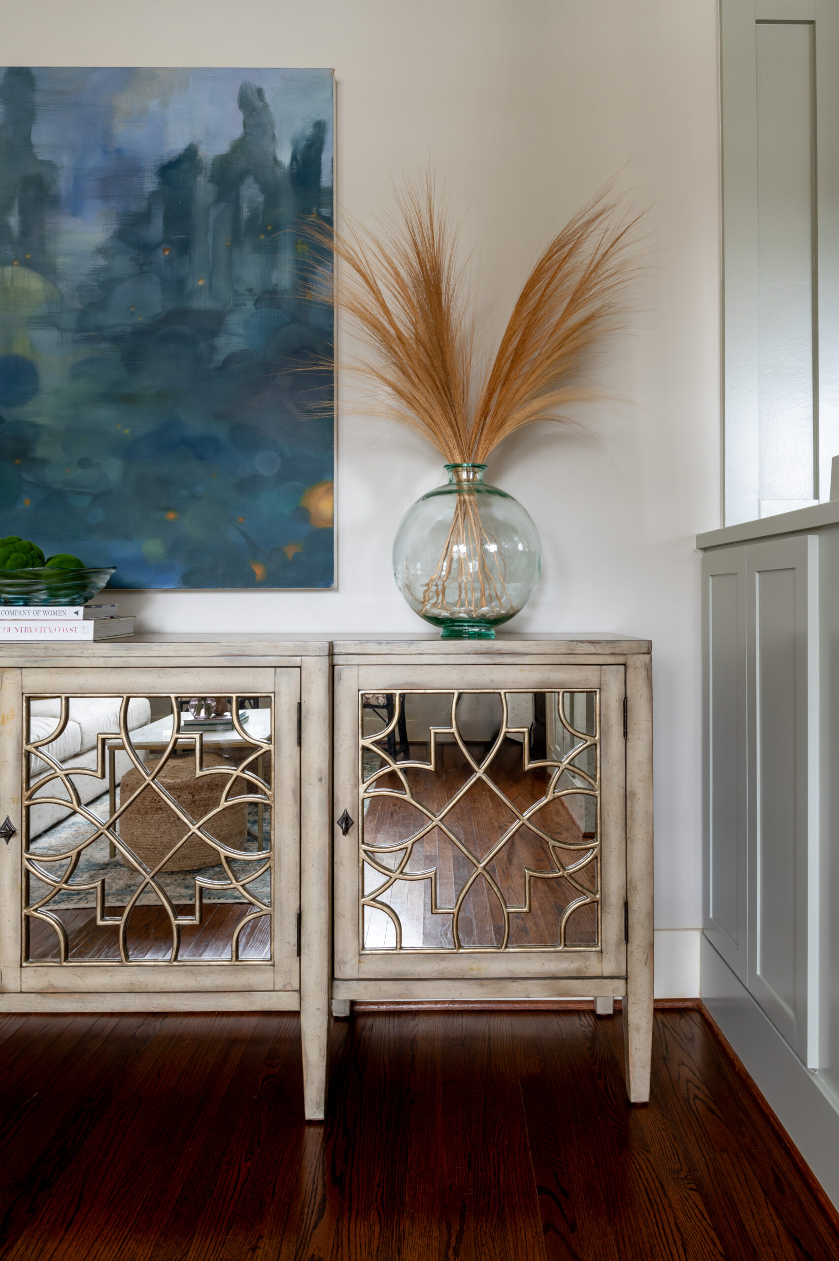 Wooden side table with wall art