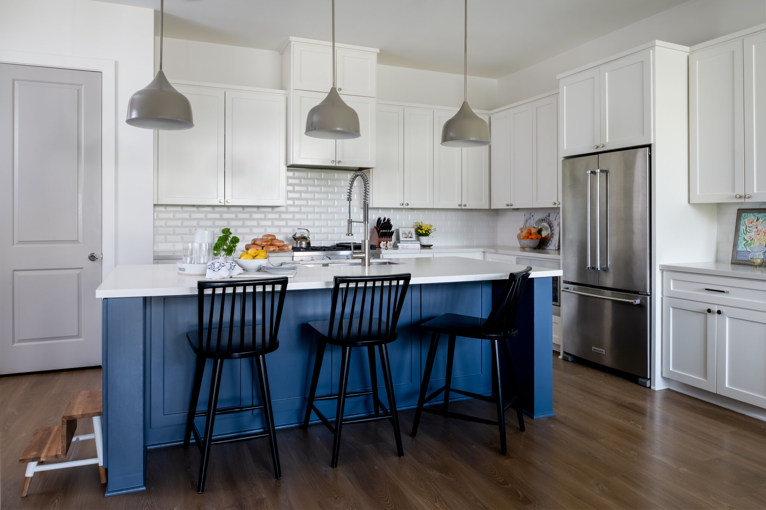 Luxury and modern kitchen interior design with blue and white kitchen island