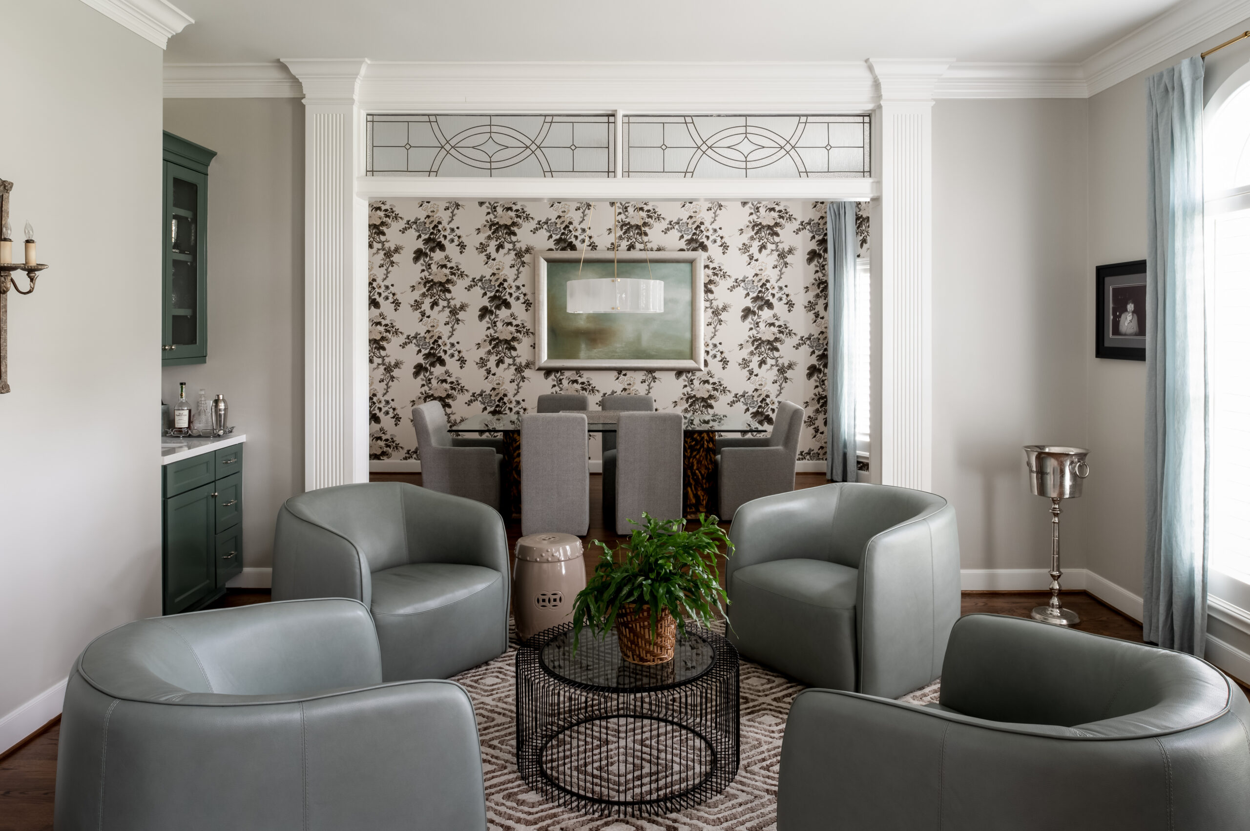 Beautiful living room interior design with grey seats and modern furniture and art
