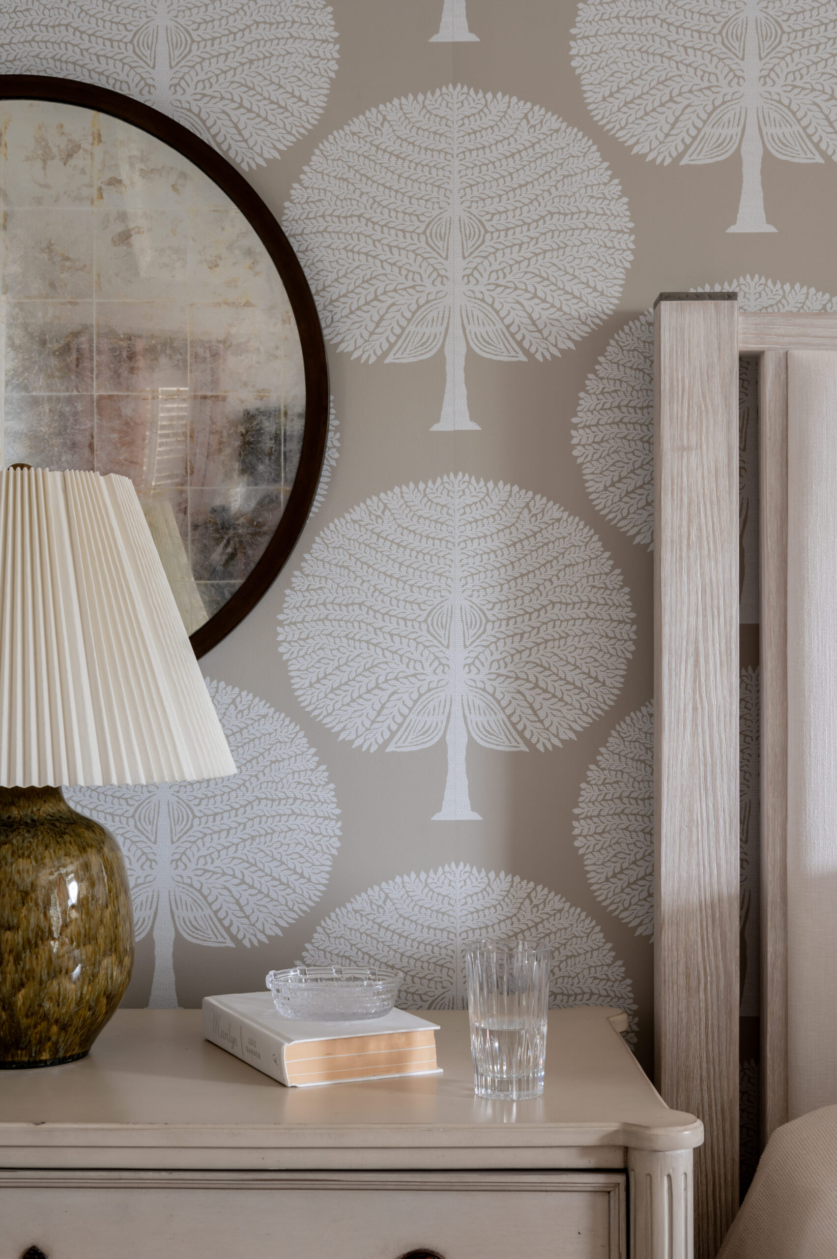 Stunning bedroom interior design with french wallpaper and styled dresser