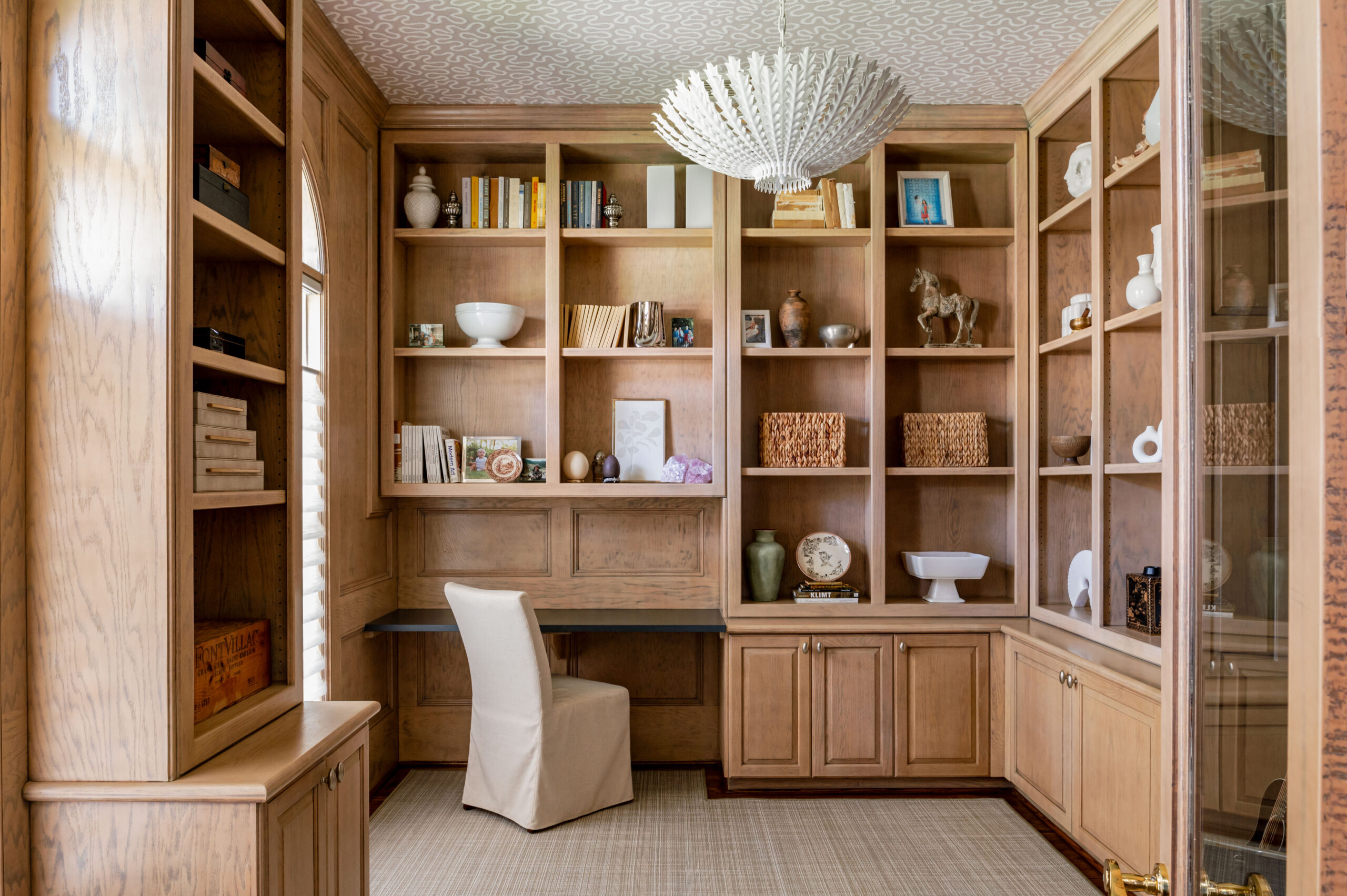 Gorgeous office interior design with wood finished and bookshelves