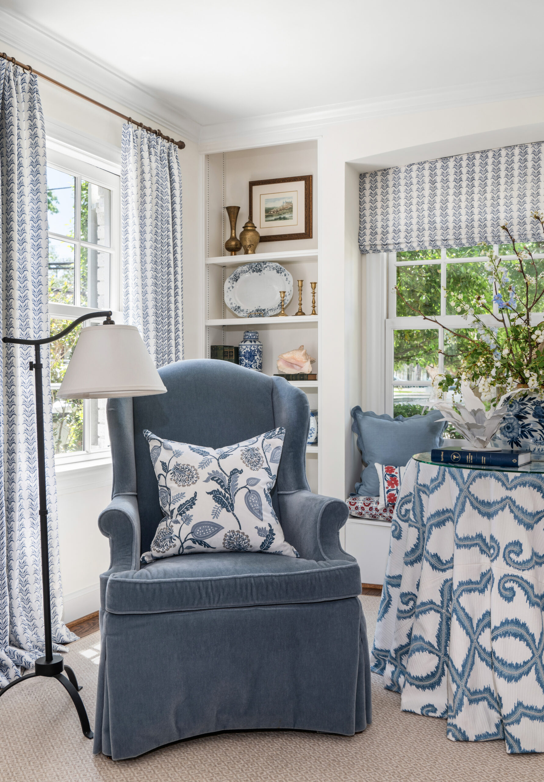 Living room interior design with beautiful blue chair and modern furniture