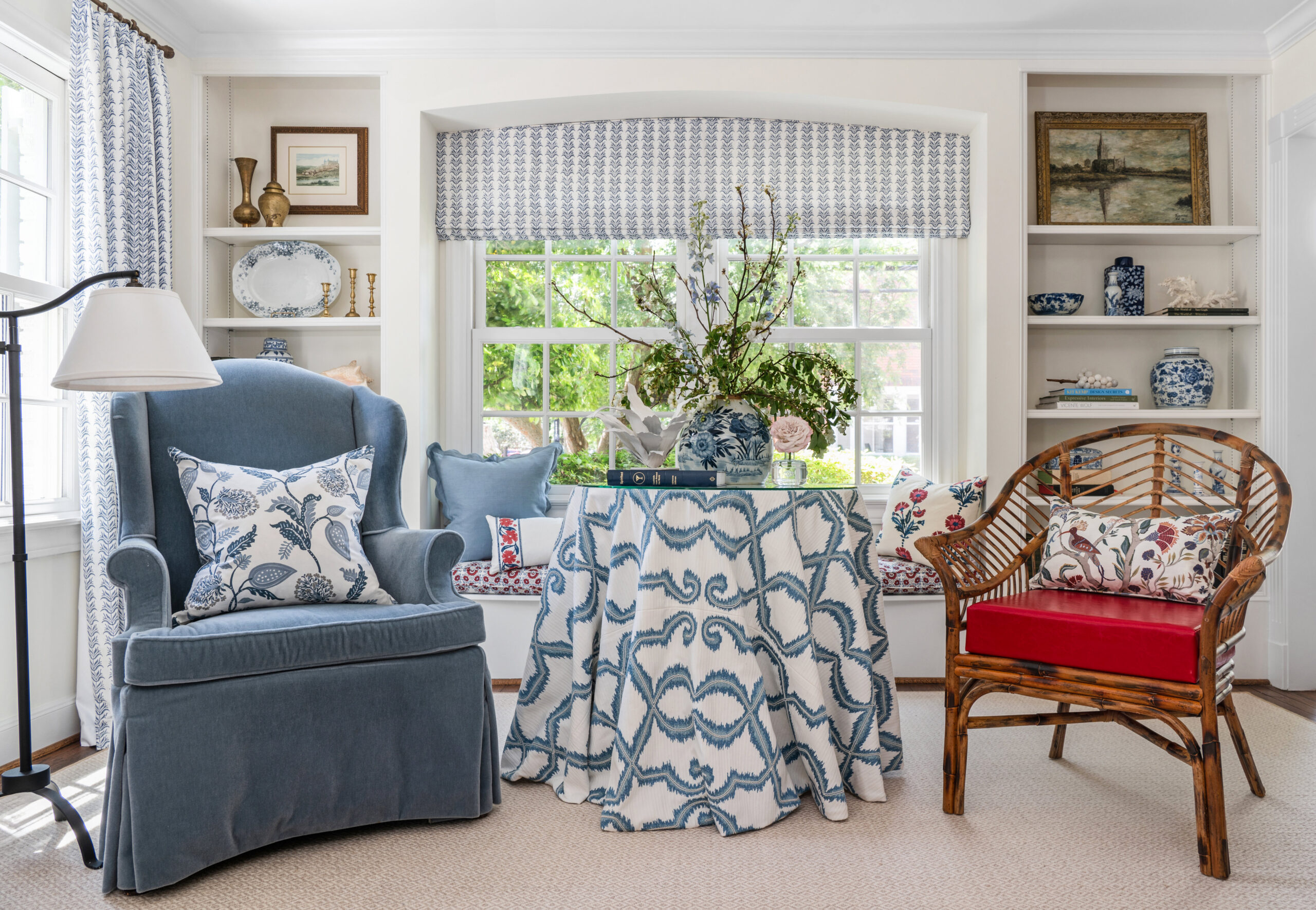 Living room interior design with beautiful blue chair and modern furniture