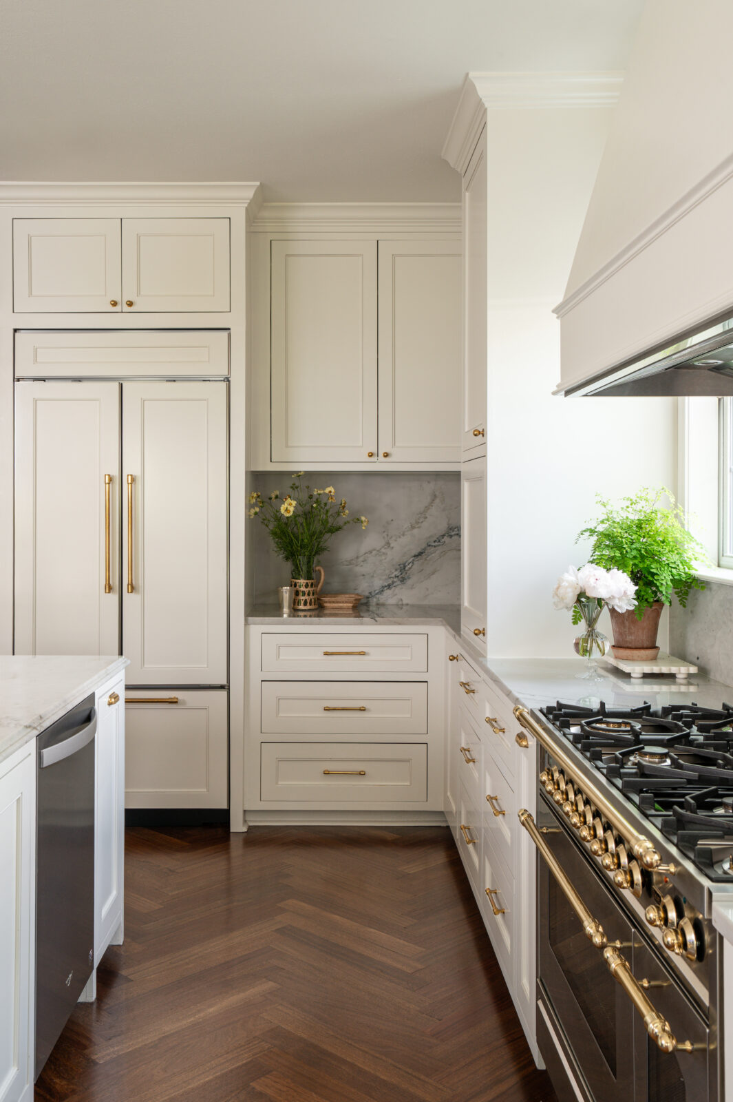 Kitchen corner styled with fresh florals and natural textures, highlighting the refined details captured in these home renovation photos.